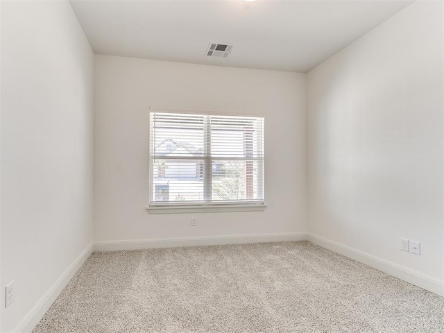 unfurnished room with carpet