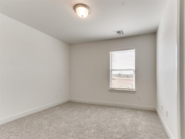 spare room with carpet flooring