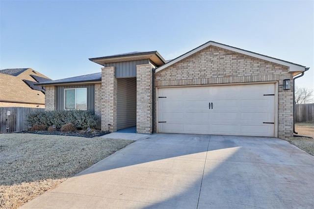 ranch-style house featuring a garage