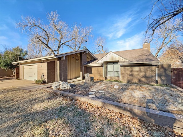 ranch-style house featuring a garage