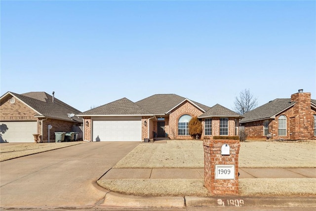 single story home with a garage