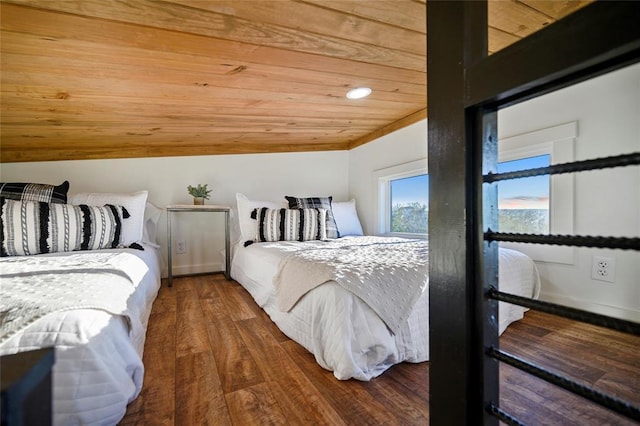 bedroom featuring wood ceiling and dark wood-type flooring