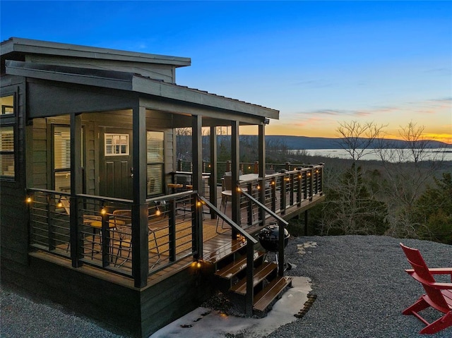 view of property exterior at dusk