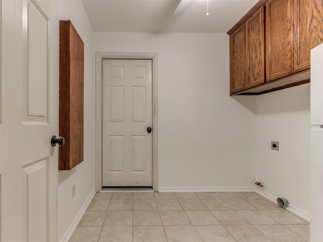 washroom featuring cabinets, ceiling fan, and hookup for an electric dryer