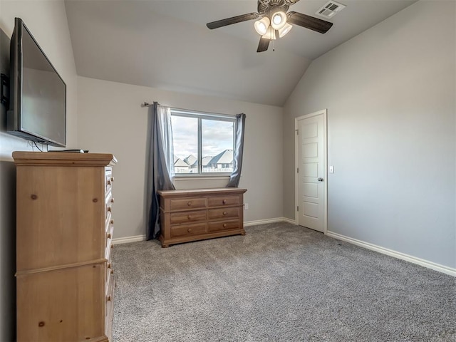 unfurnished bedroom with lofted ceiling, light colored carpet, and ceiling fan