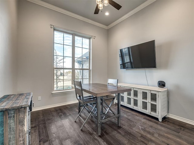 dining room with crown molding, ceiling fan, and dark hardwood / wood-style floors