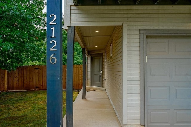 property entrance featuring a garage