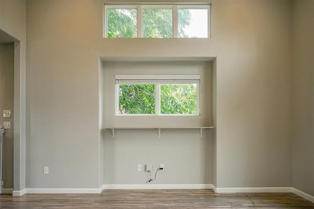 empty room featuring wood-type flooring