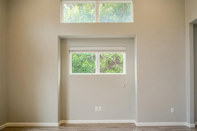 empty room featuring hardwood / wood-style flooring