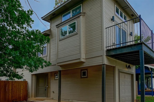 view of property exterior with a garage