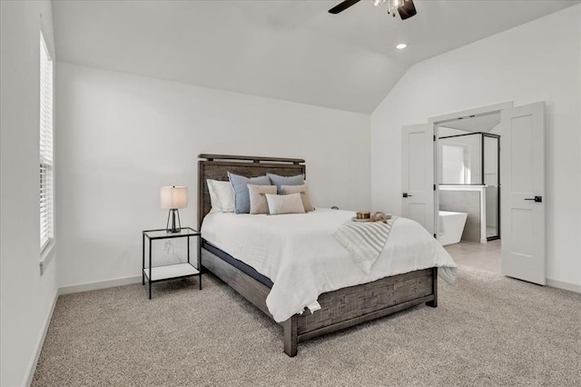 carpeted bedroom featuring ceiling fan and vaulted ceiling