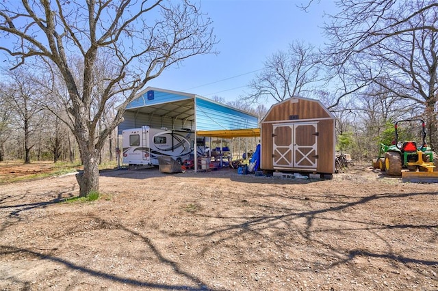 view of outbuilding featuring a carport