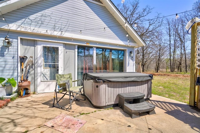 view of patio featuring a hot tub