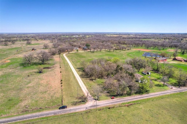 birds eye view of property featuring a rural view