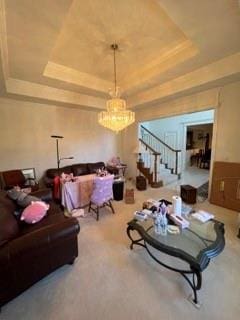 living room featuring a raised ceiling