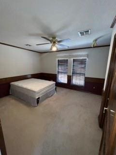 unfurnished bedroom with light colored carpet and ceiling fan