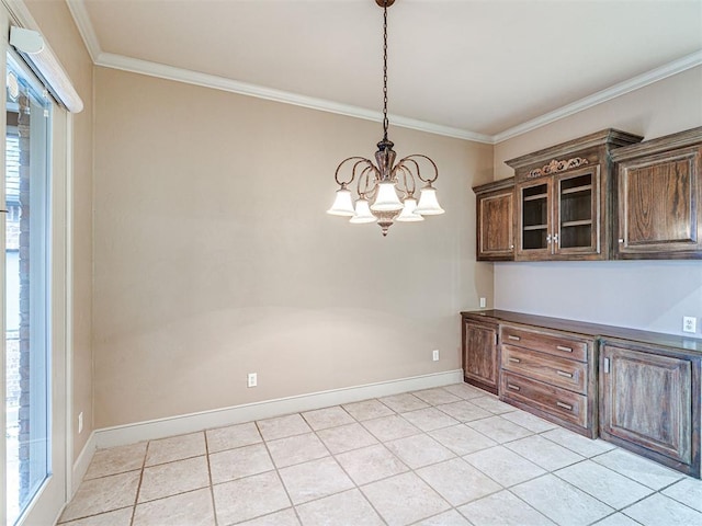 unfurnished dining area featuring crown molding, a chandelier, and light tile patterned flooring