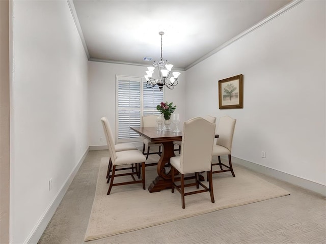 carpeted dining space with crown molding and an inviting chandelier