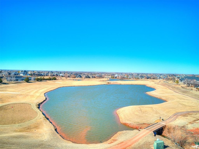 view of pool featuring a water view