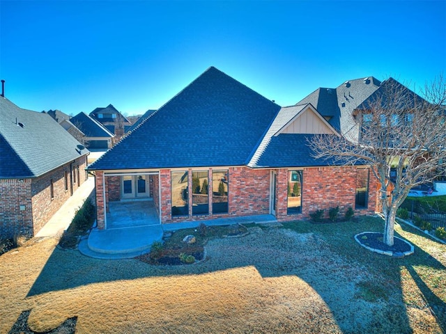 rear view of house featuring a patio