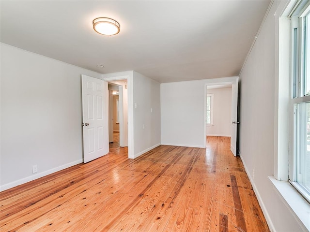 empty room with light wood-type flooring