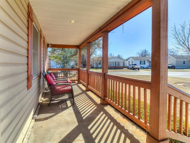 wooden deck featuring covered porch