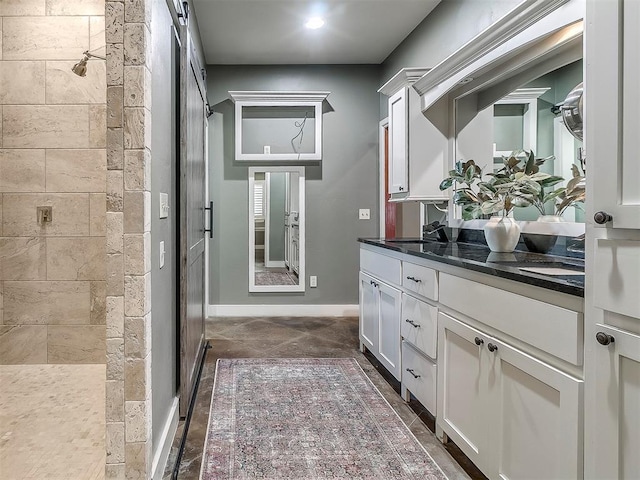 bathroom with vanity and walk in shower