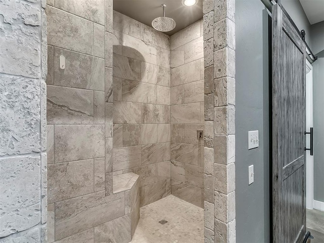 bathroom featuring a tile shower