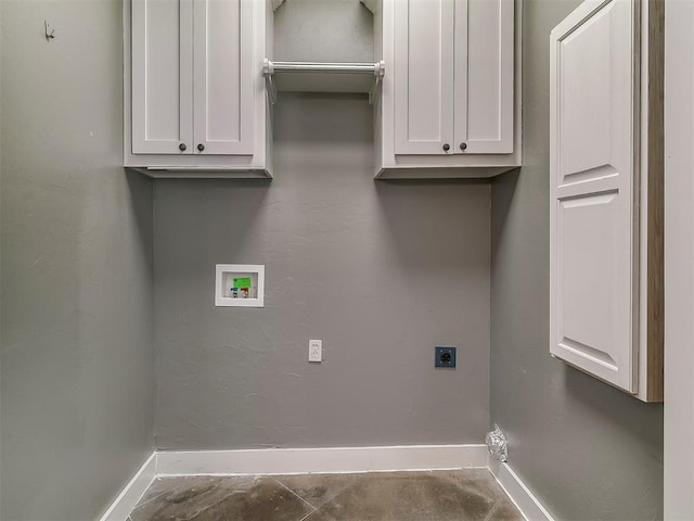 laundry room featuring washer hookup, cabinets, and hookup for an electric dryer