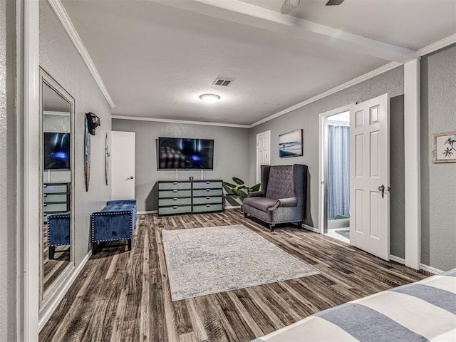 living room featuring hardwood / wood-style flooring and crown molding