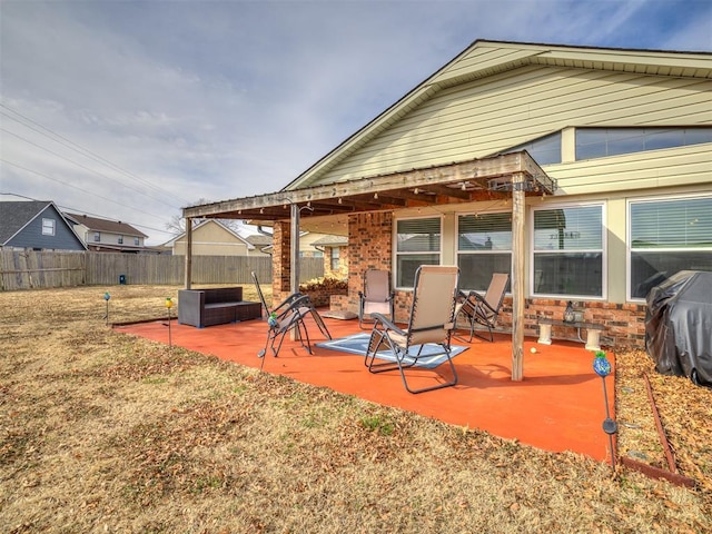 rear view of property with a patio