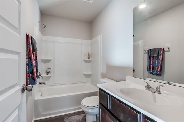 full bathroom with vanity, wood-type flooring, bathtub / shower combination, and toilet