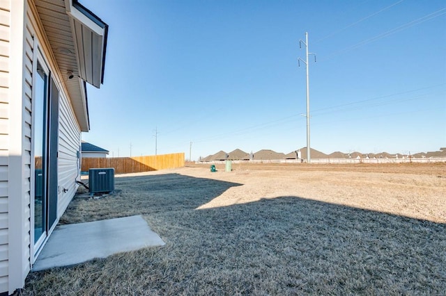 view of yard featuring central AC