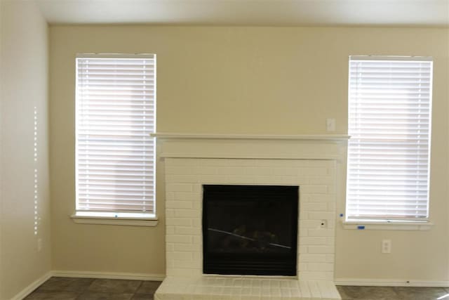 interior details featuring a fireplace