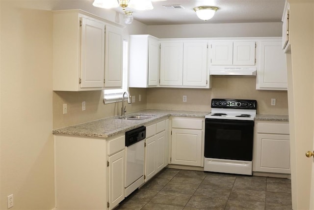 kitchen with range with electric stovetop, dishwasher, sink, white cabinets, and dark tile patterned flooring