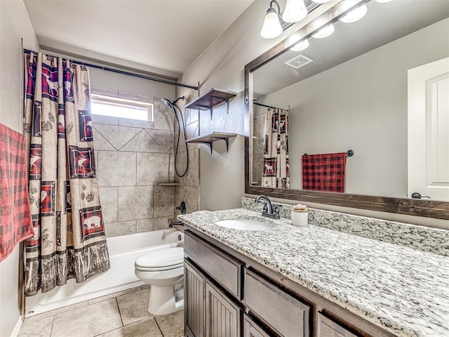 full bathroom with vanity, shower / tub combo with curtain, tile patterned floors, and toilet