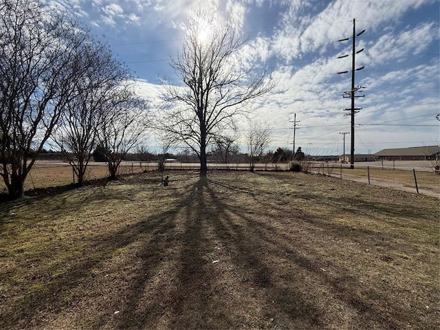 view of yard with a rural view