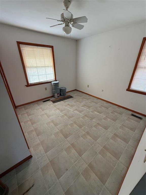 spare room featuring ceiling fan