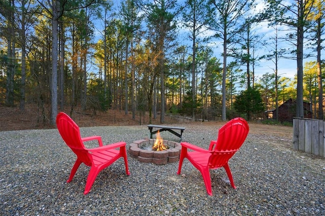 view of patio / terrace featuring an outdoor fire pit