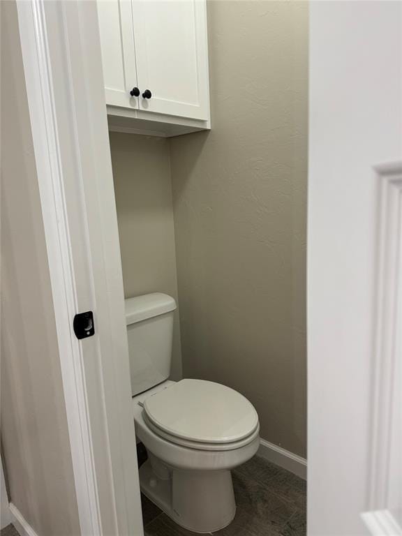 bathroom featuring toilet