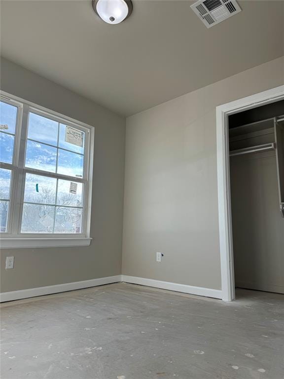 unfurnished bedroom featuring a closet