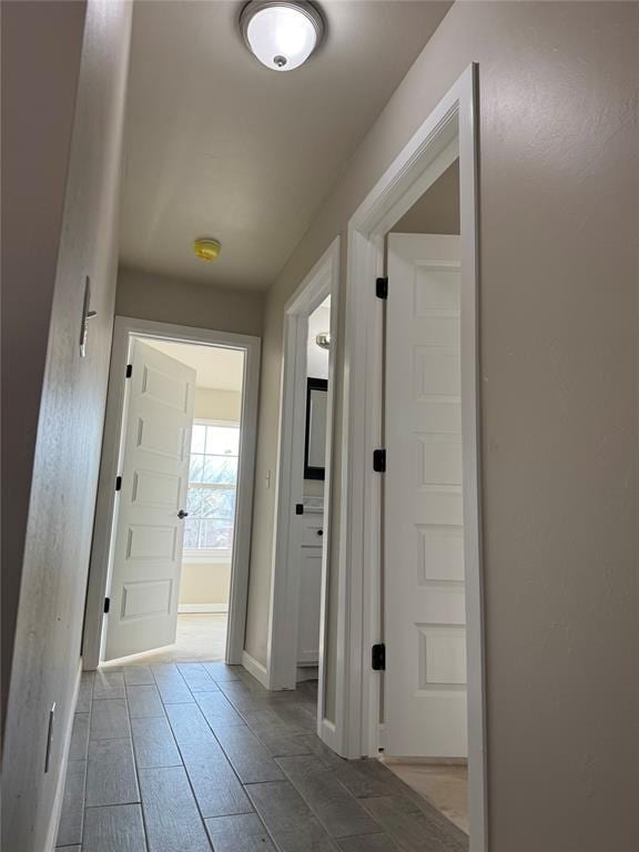 corridor featuring light hardwood / wood-style flooring