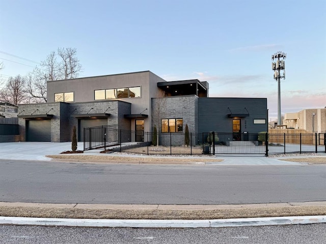 view of front of property featuring a garage