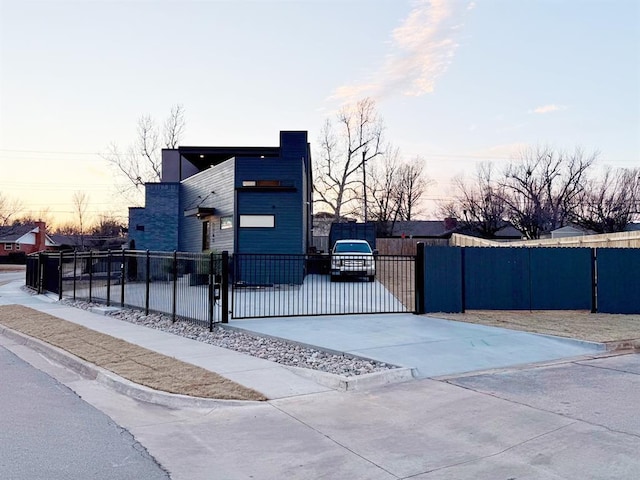 view of property exterior at dusk