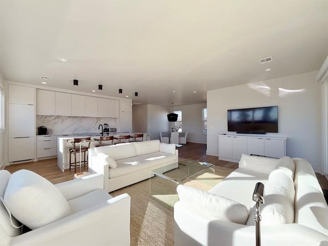 living room with light wood-type flooring