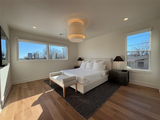 bedroom featuring hardwood / wood-style flooring