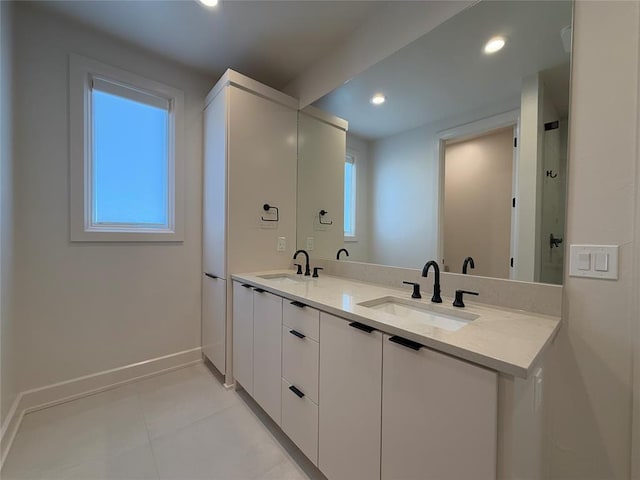 bathroom featuring vanity and plenty of natural light