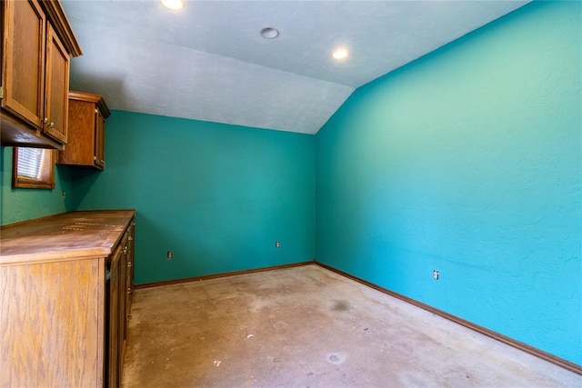 interior space featuring vaulted ceiling