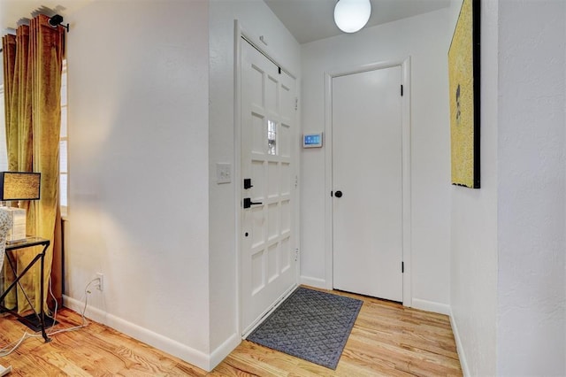 foyer entrance featuring light hardwood / wood-style floors