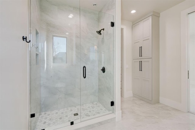 bathroom featuring an enclosed shower